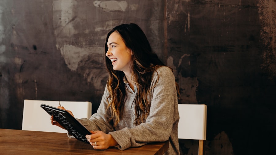 A partner filling in the two-minute application over coffee
